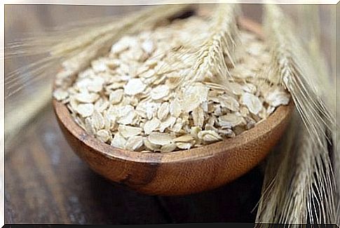 Wooden bowl full of oatmeal, an important part of an antidepressant diet