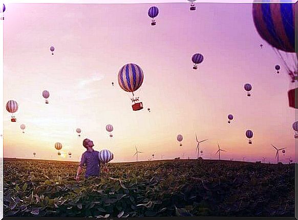 Man with hot air balloons