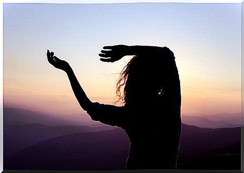 Woman dancing on the mountain