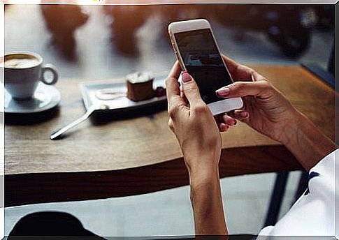 woman-looking-at-mobile-phone