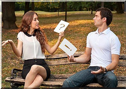 Man and woman sitting on bench