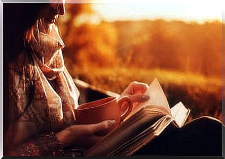 A woman reading a book.