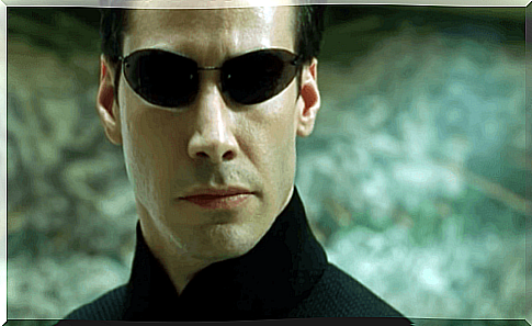 Keanu Reeves as Neo in the movie The Matrix