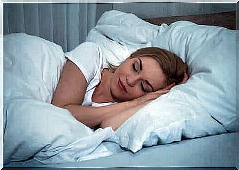 Woman getting a good night's sleep.