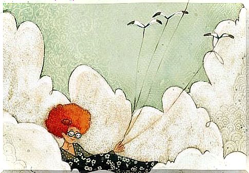 Woman lying in the clouds