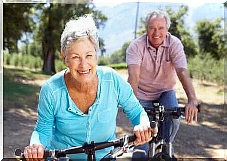 Two people on bicycles.