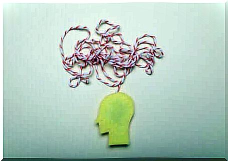 A clip of a head with a thread illustrating thoughts.