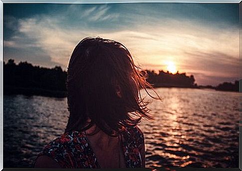 Woman looking towards the sea