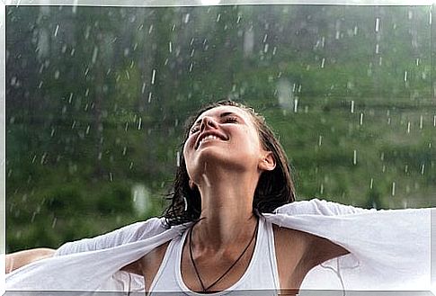 Happy girl in the rain